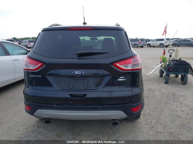 1FMCU9GX9EUA24558 Ford 2014