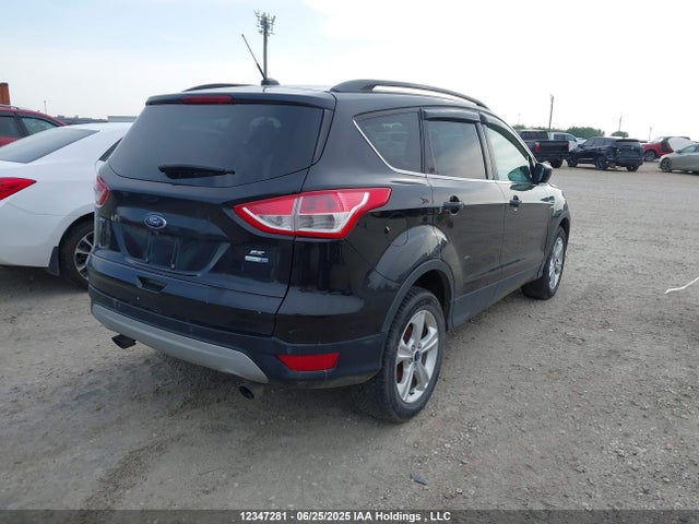 1FMCU9GX9EUA24558 Ford 2014