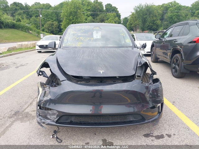 Tesla Model Y 2024 7SAYGDED7RF078679 Image 13