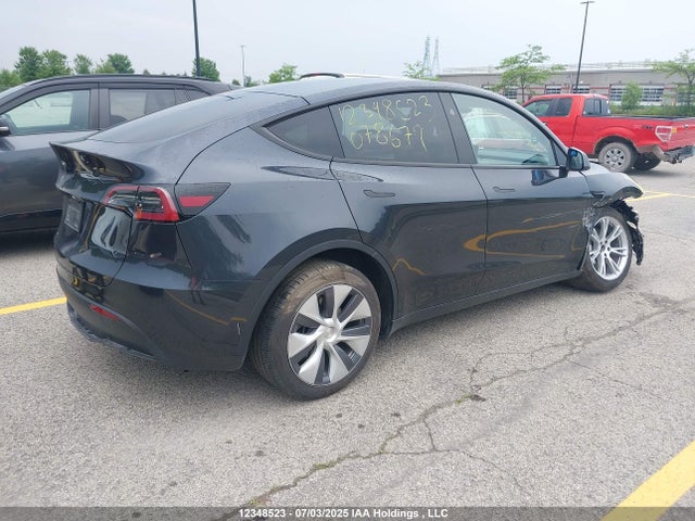 Tesla Model Y 2024 7SAYGDED7RF078679 Image 4