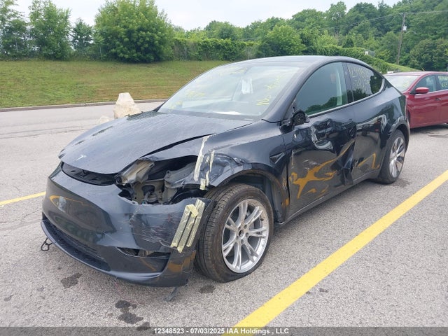 Tesla Model Y 2024 7SAYGDED7RF078679 Image 6