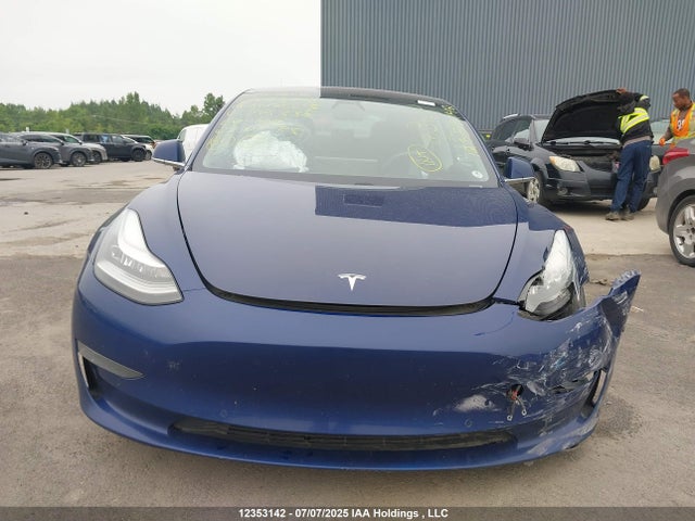 5YJ3E1EB5KF199338 Tesla 2019