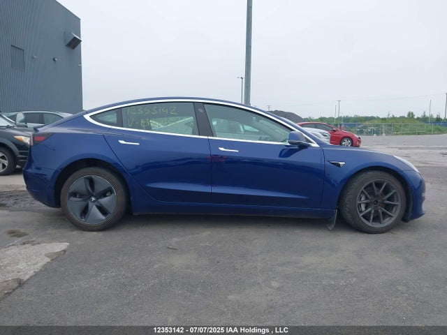 5YJ3E1EB5KF199338 Tesla 2019