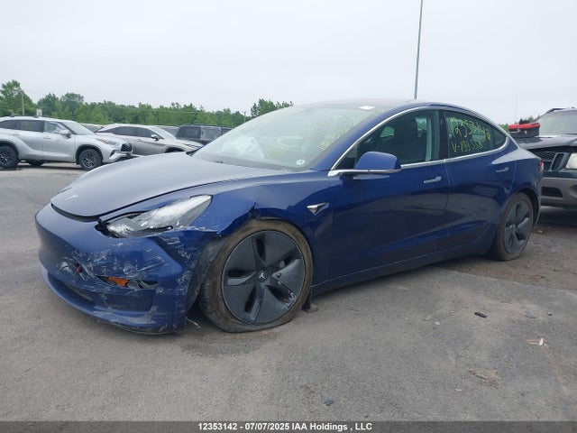 5YJ3E1EB5KF199338 Tesla 2019