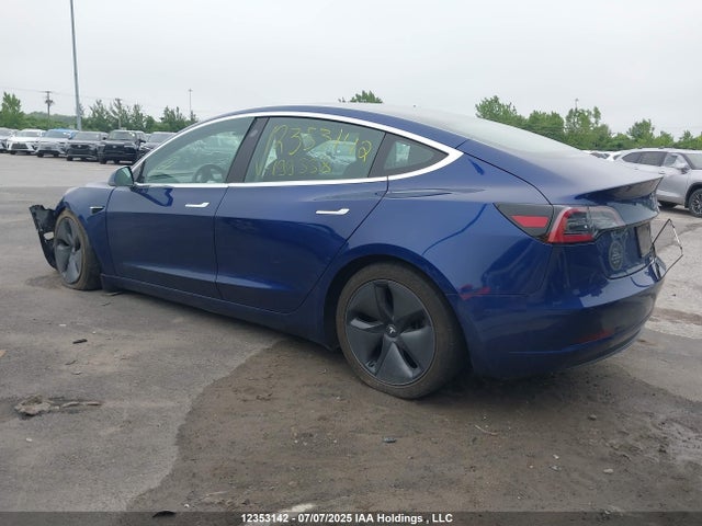 5YJ3E1EB5KF199338 Tesla 2019