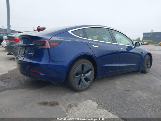 5YJ3E1EB5KF199338 Tesla 2019