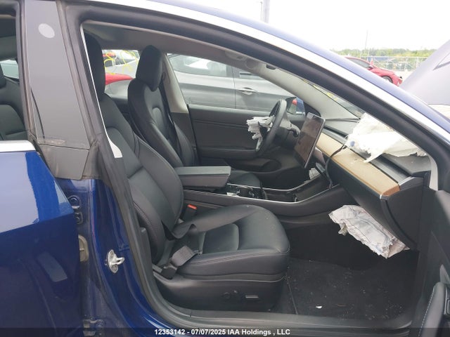 5YJ3E1EB5KF199338 Tesla 2019
