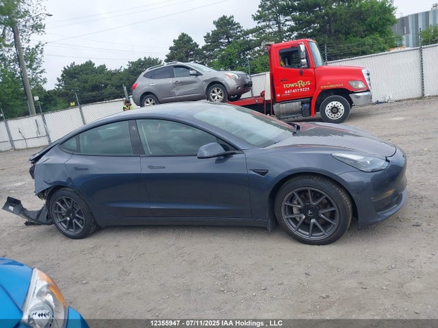 5YJ3E1EB7NF128694 Tesla MODEL 3