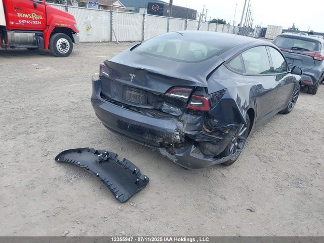 5YJ3E1EB7NF128694 Tesla MODEL 3