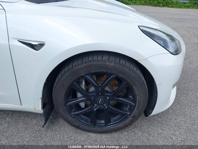 5YJ3E1EB4LF626459 Tesla 2020
