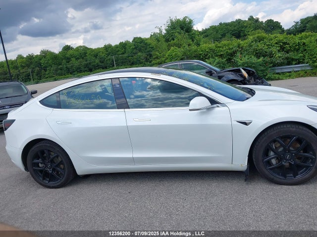 5YJ3E1EB4LF626459 Tesla 2020