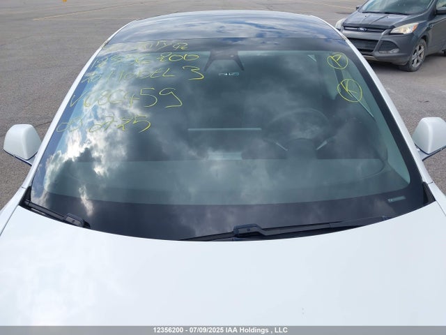 5YJ3E1EB4LF626459 Tesla 2020