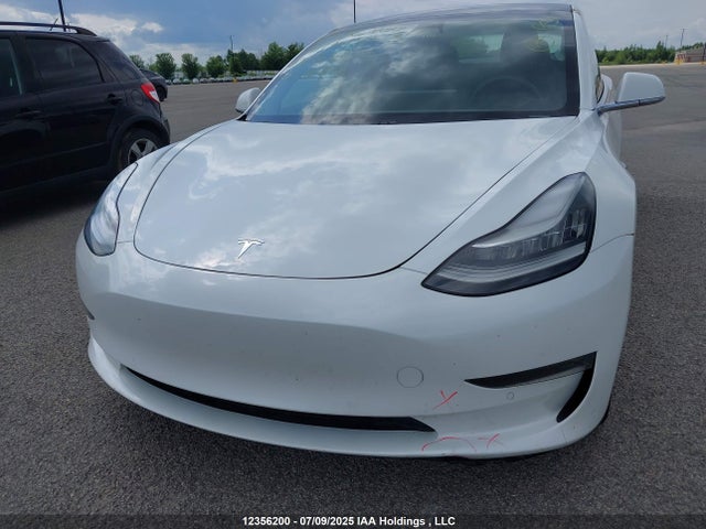 5YJ3E1EB4LF626459 Tesla 2020