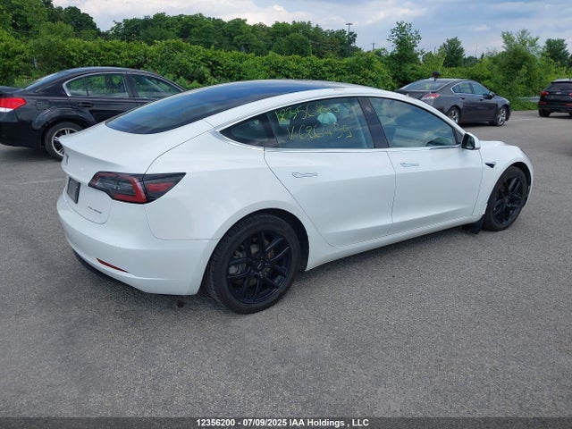 5YJ3E1EB4LF626459 Tesla 2020