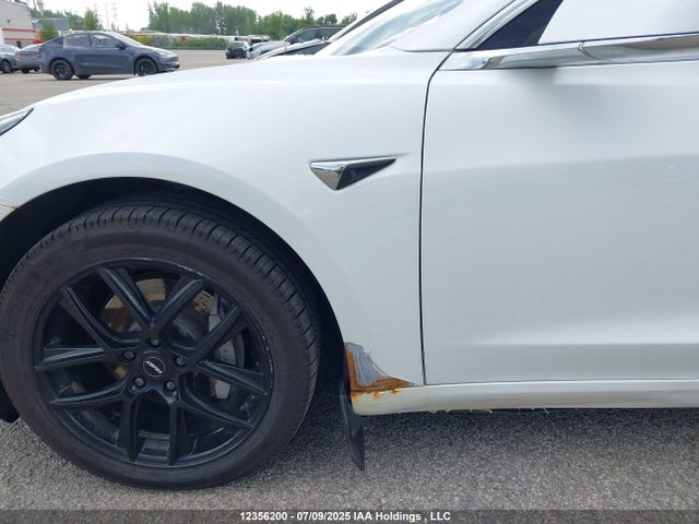 5YJ3E1EB4LF626459 Tesla 2020