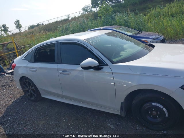 Honda l15b7 2022 2HGFE1F99NH003846 Image 12