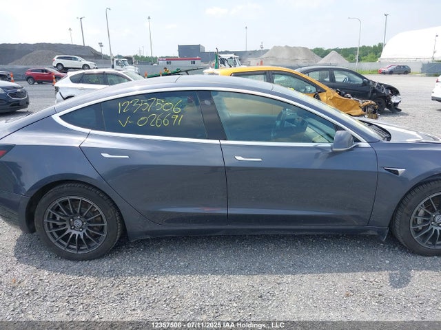 5YJ3E1EA4JF026691 Tesla 2018