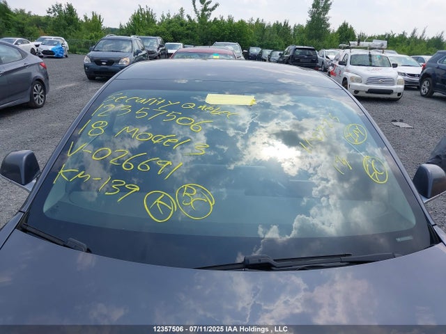 5YJ3E1EA4JF026691 Tesla 2018