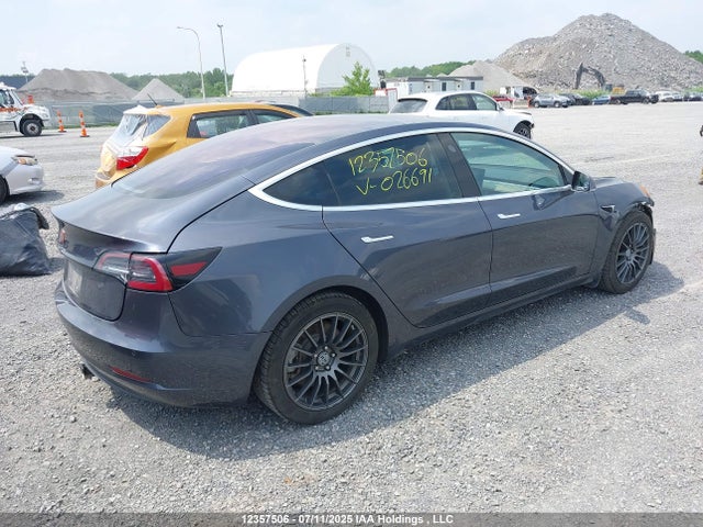 5YJ3E1EA4JF026691 Tesla 2018