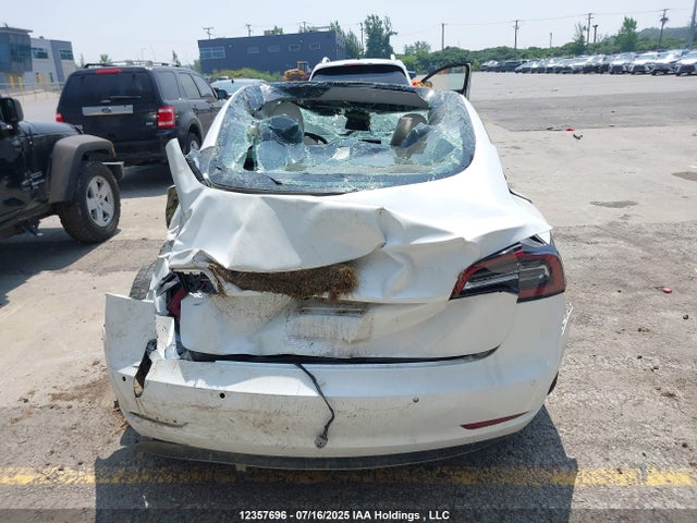 5YJ3E1EA0NF337394 Tesla 2022