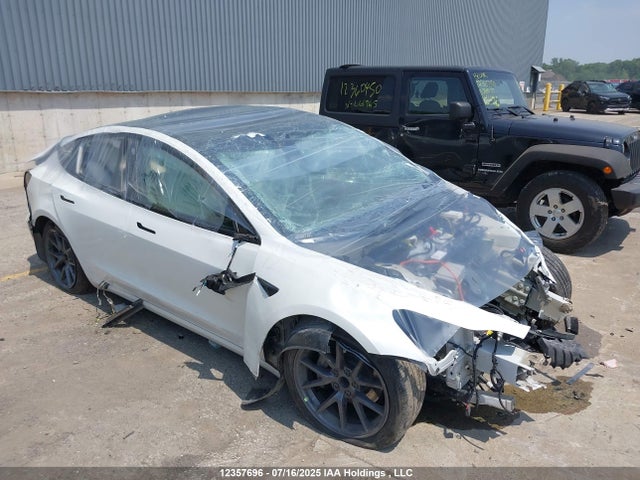 5YJ3E1EA0NF337394 Tesla 2022