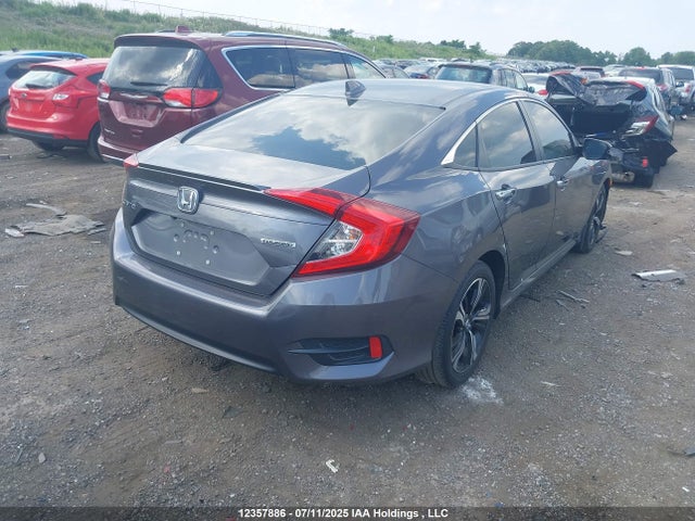 2018 Honda Civic Touring მანქანა იყიდება აუქციონზე, vin: 2HGFC1F9XJH108251, აუქციონის ნომერი: 12357886