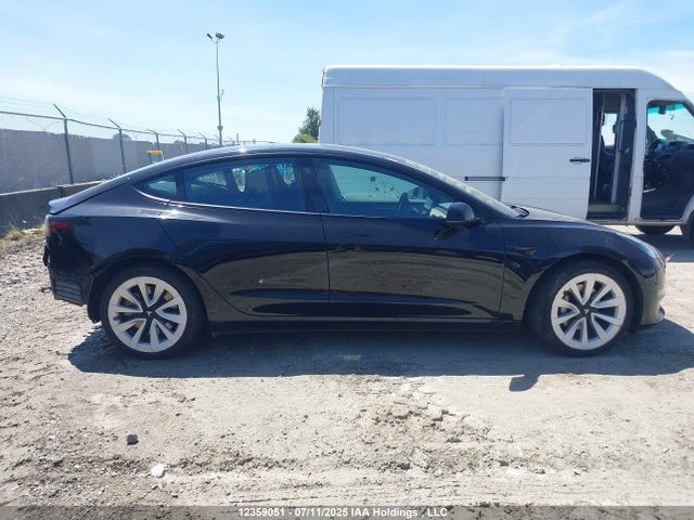 5YJ3E1EA7NF258241 Tesla 2022