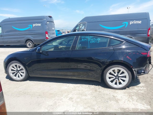 5YJ3E1EA7NF258241 Tesla 2022