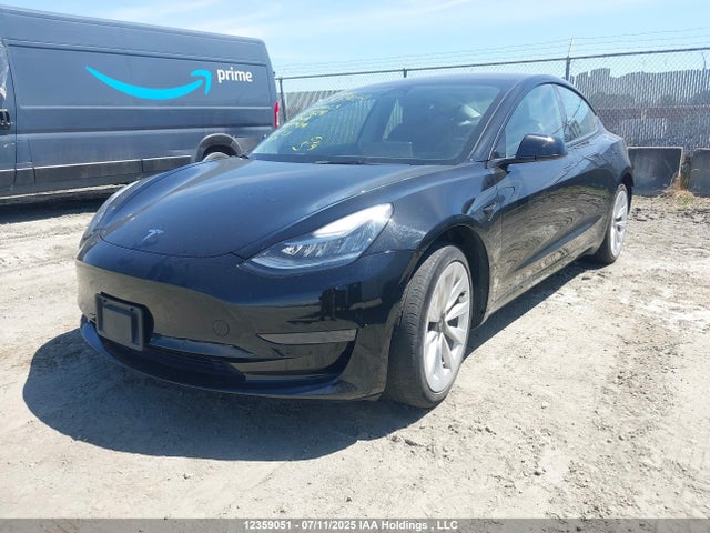 5YJ3E1EA7NF258241 Tesla 2022