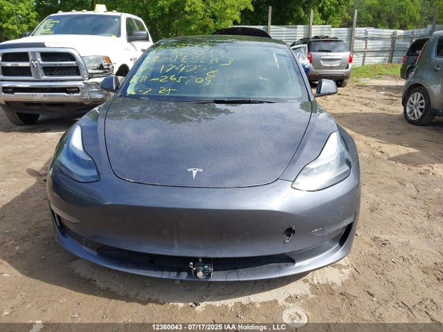 5YJ3E1EB4NF174998 Tesla 2022