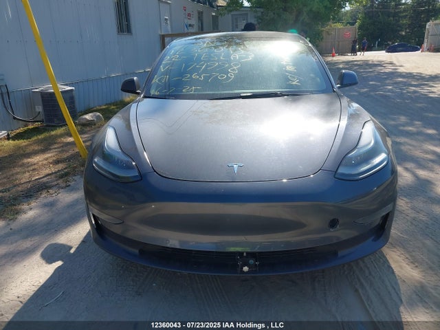 5YJ3E1EB4NF174998 Tesla 2022