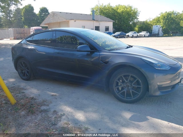 5YJ3E1EB4NF174998 Tesla 2022