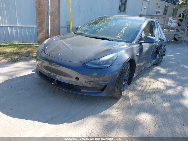 5YJ3E1EB4NF174998 Tesla 2022