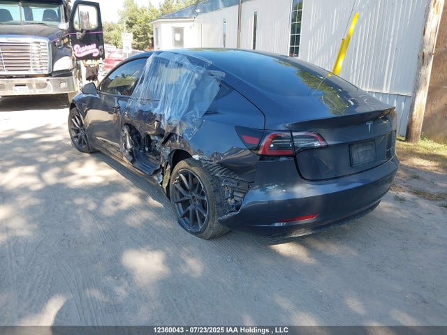 5YJ3E1EB4NF174998 Tesla 2022