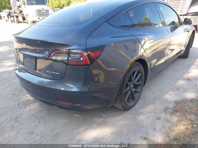 5YJ3E1EB4NF174998 Tesla 2022