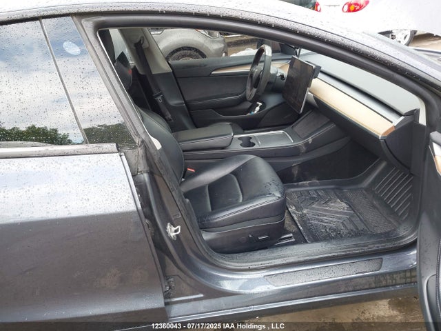 5YJ3E1EB4NF174998 Tesla 2022