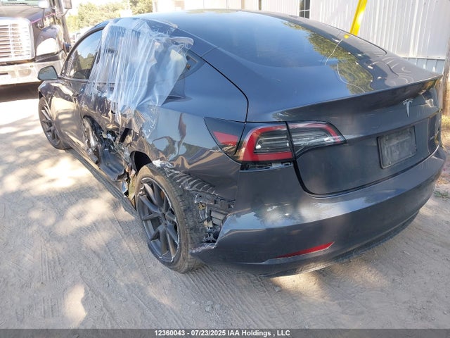 5YJ3E1EB4NF174998 Tesla 2022