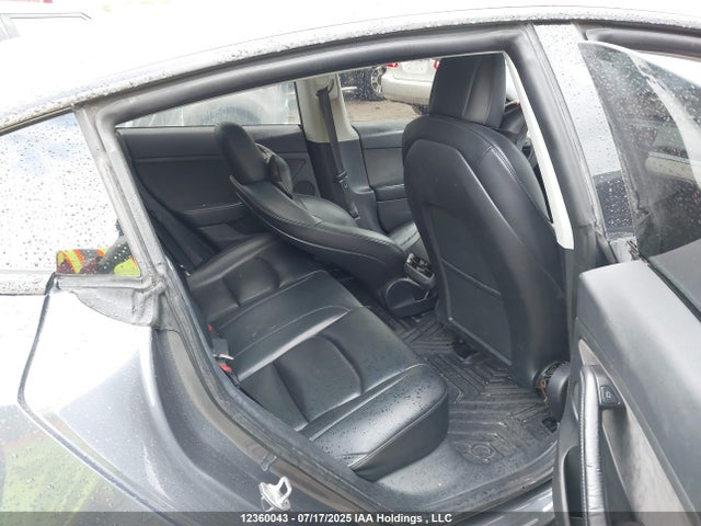 5YJ3E1EB4NF174998 Tesla 2022