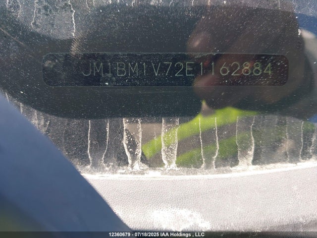 JM1BM1V72E1162884 Mazda pe