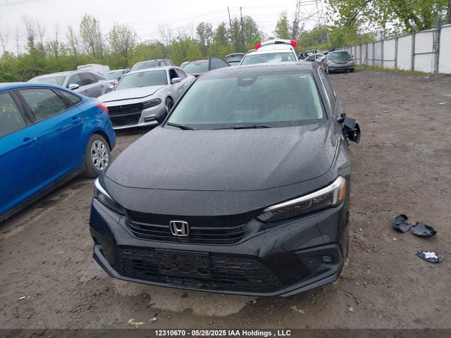 2HGFE1F97RH001258 Honda l15b7