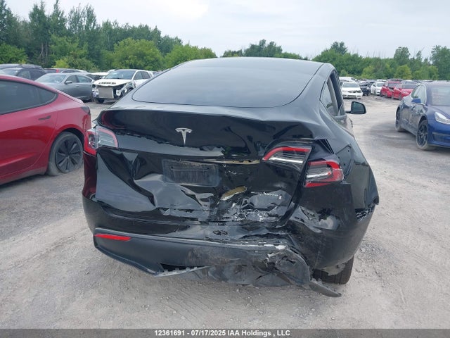Tesla Model Y 2024 7SAYGDEE8RF043433 Image 6