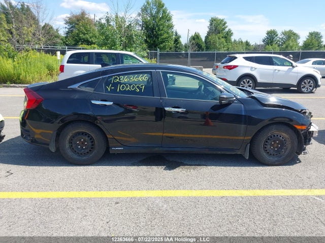 2HGFC1F9XJH102059 Honda l15b7