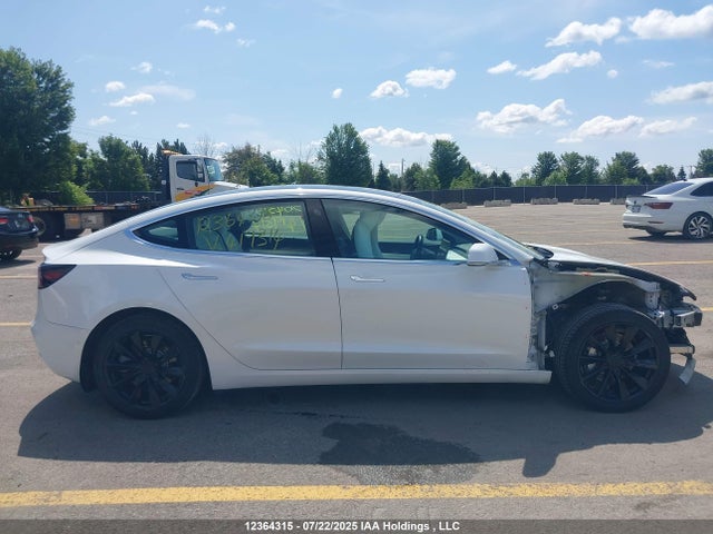 5YJ3E1EA9KF419314 Tesla 2019