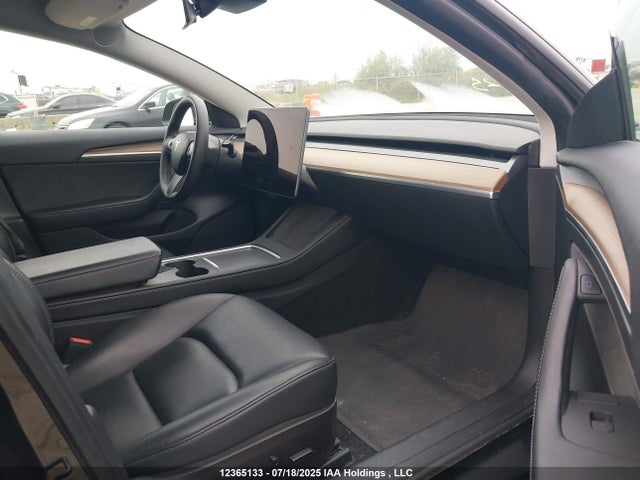 5YJ3E1EA6PF414921 Tesla 2023