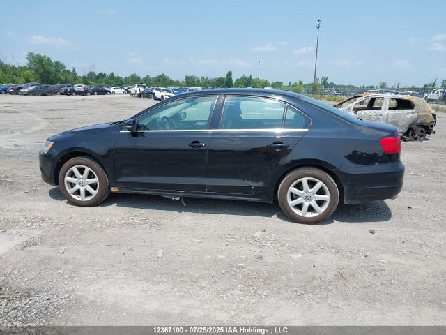 3VWB07AJ9EM409575 Volkswagen Jetta