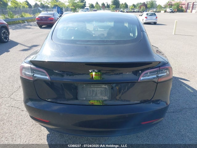 5YJ3E1EA1NF258381 Tesla 2022