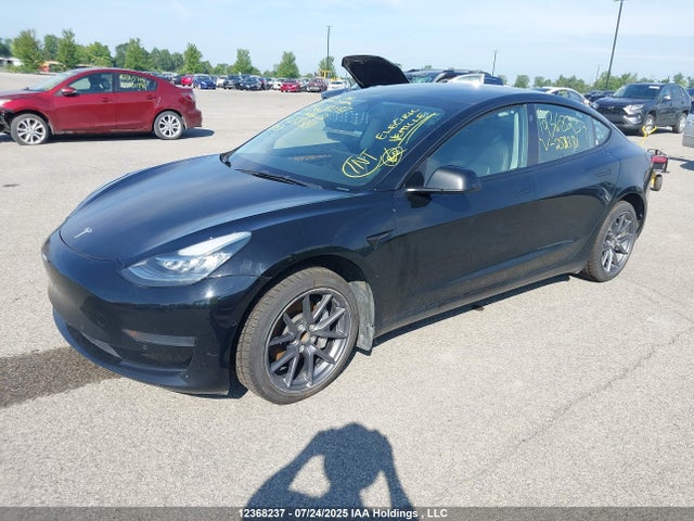 5YJ3E1EA1NF258381 Tesla 2022