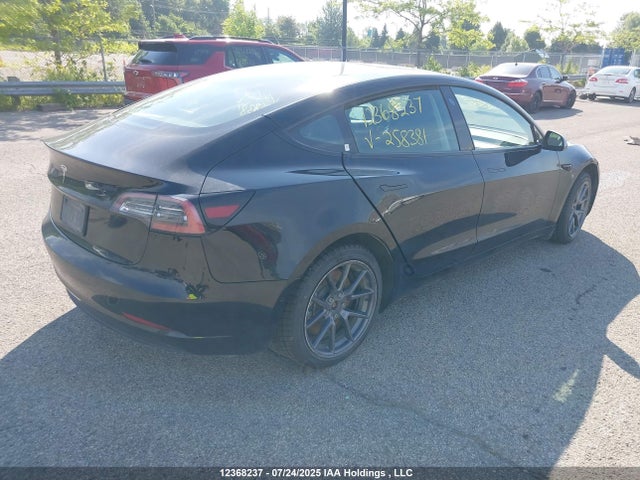 5YJ3E1EA1NF258381 Tesla 2022