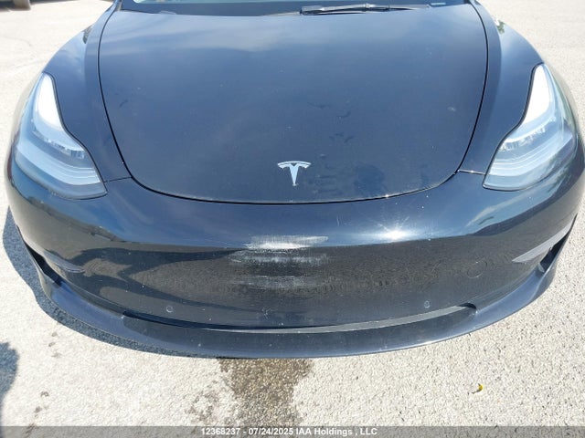 5YJ3E1EA1NF258381 Tesla 2022