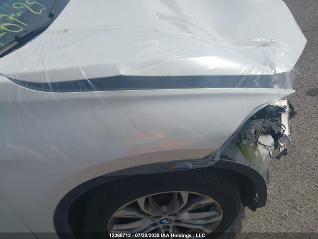WBXHT3C33G5F65881 BMW X1